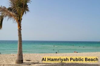 Al Hamriyah Public Beach in Sharjah with white sand and calm blue water