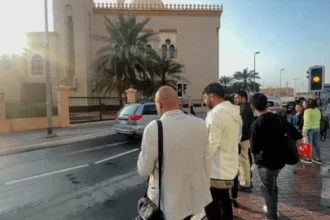 Satwa Big Mosque exterior with white dome and tall minaret in Al Satwa Dubai