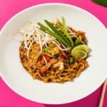 Authentic Thai dishes served at Fuchsia Urban Thai restaurant in Dubai featuring Pad Thai, Green Curry, Tom Yum Soup, and Mango Sticky Rice.